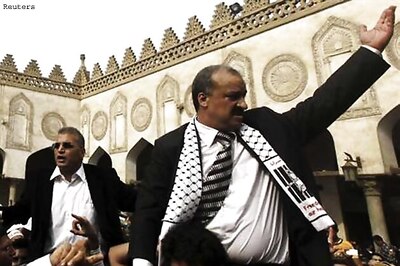 Egypt arrests Muslim Brotherhood official and warns protesters