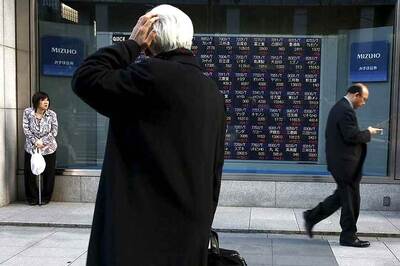 Asian Shares Hit Two-year High After Fed Signals Gradual Tightening