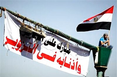 Fed up with army, Egyptians back in Tahrir Square