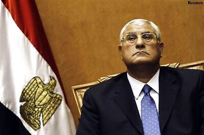 Egypt orders Brotherhood arrests, interim leader sworn in