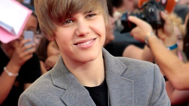 Did Justin Bieber spit on his neighbour?