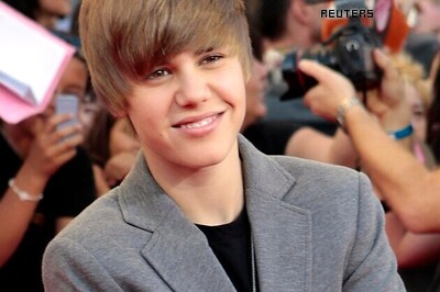 Did Justin Bieber spit on his neighbour?