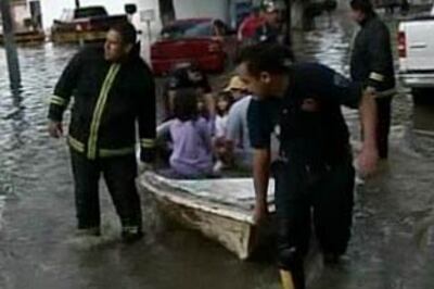 Rain floods Mexico City homes, subway