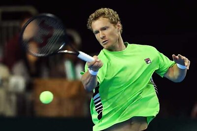 Ferrer shocked in Barcelona, Nadal eases through