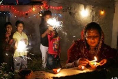 Diwali celebrated with lights, crackers and sms