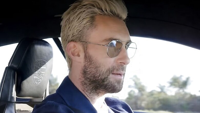 Maroon 5 Lead Singer Adam Levine Drives Porsche Mission E Sportscar [Video]
