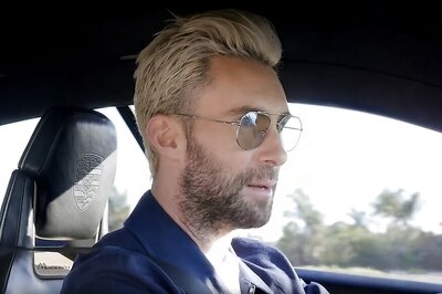 Maroon 5 Lead Singer Adam Levine Drives Porsche Mission E Sportscar [Video]