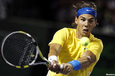 Nadal blasts past Tsonga to meet Roddick