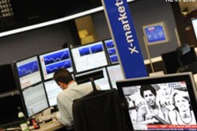 Obama lifts mood but markets tank, jobs cut