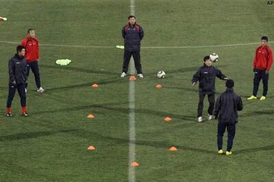 North Korean team looks to appease leader Kim