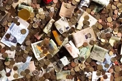 ‘Why?’: This Manhole Filled With Coins And Notes In France Has Internet Confused