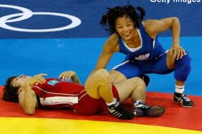 Yoshida, Huynh win women's wrestling golds