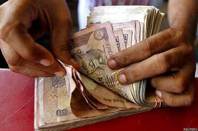 Rupee surges 23 paise to 3-week high of 61.97 vs US dollar