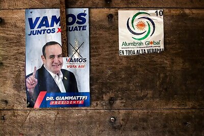 Guatemala Indigenous families pick through remains of homes