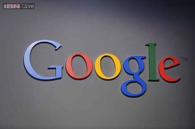 Google shares break $1,000 barrier as mobile pays off