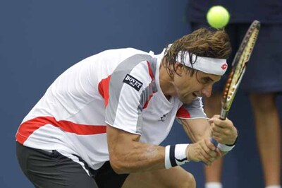 Ferrer goes past Hewitt in third round