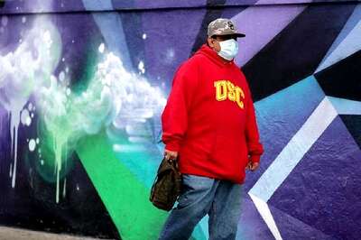 Americans Told to Wear Masks Over Fears That Simply Breathing Could Spread Coronavirus