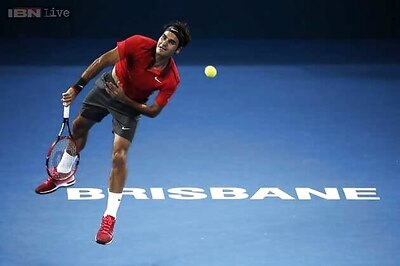 Rusty Federer scrapes through to win season debut in Brisbane