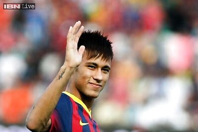 Neymar double lifts Barcelona to second after Valdes injury blow