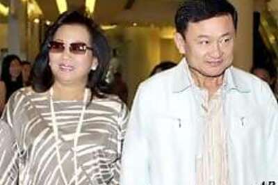 Ousted Thai PM arrives in London