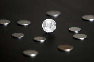 Rupee at 4-month high on reforms, RBI eyed