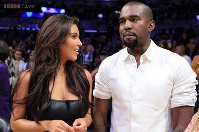 Has Kanye West ordered Kim Kardashian to stop smiling for photographers when they are out together?