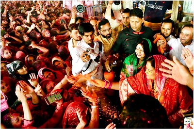 Vasundhara Raje Sprinkles 'Gulal' on Devotees at Govind Dev Temple