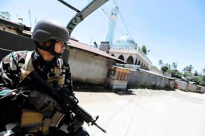 Snipers, Bombs, Mortars: Philippine Troops Battle Against Islamists