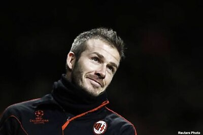 Beckham back with family after surgery