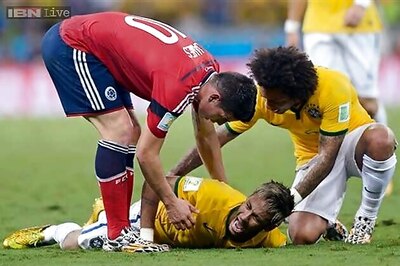 World Cup 2014: Neymar returns to Brazil camp in ambulance