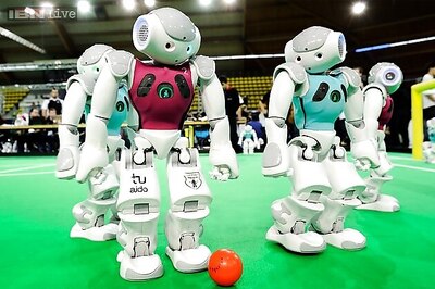 RoboCup 2014: Football-playing robots eye their own cup, and beyond