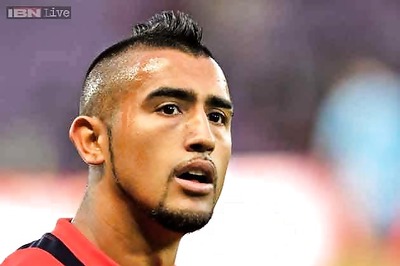 Fit-again Vidal arrives in Brazil with Chile squad