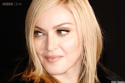 Madonna visits ex-husband Sean Penn's aid projects