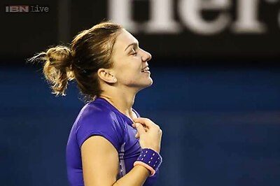 Simona Halep halts Wickmayer to reach quarter-finals