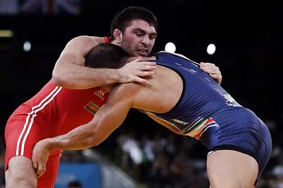 Sharifov wins men's wrestling 84kg gold