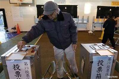 Japan's Liberal Democratic Party surges back to power