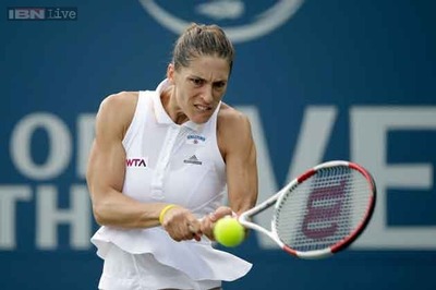 Andrea Petkovic through, Samantha Stosur out at Stanford