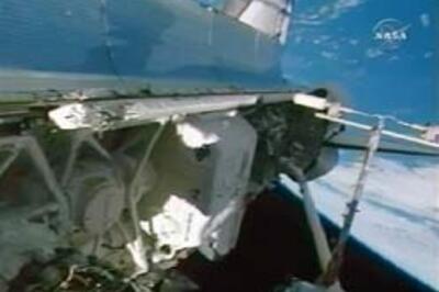 Discovery docks with space station