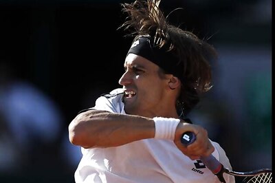 Malisse ousts Ferrer in 1st round of Topshelf Open